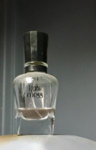 a bottle of pink Kate Moss perfume